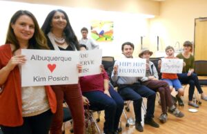 Kim's family, friends and coworkers celebrate his achievement.